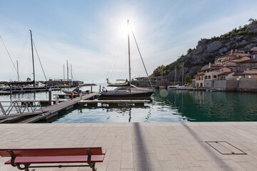 Fototapeta na wymiar Beautiful sunny day in the bay of Portopiccolo Sistiana. Duino. Italy