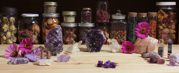 Amethyst Crystals and Flowers On Meditation Table