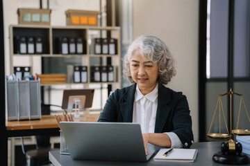 Lawyer business man working with paperwork on his desk in office workplace for consultant lawyer in office.
