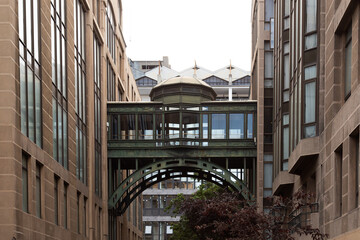 Low angle view of enclosed skyway between two buildings in the historical sector of Santiago, Chile