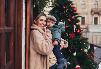 mom and little baby on a winter walk