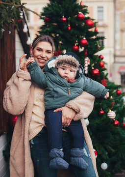 mom and little baby on a winter walk