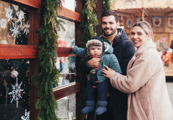 Obraz premium family walk with baby before christmas