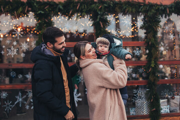 family walk with baby before christmas