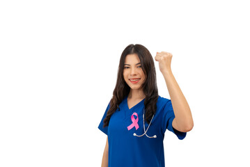 Doctor nurse woman in blue uniform stuck pink ribbon symbolizing World Cancer Day on the chest, raise her hands to fight Breast Cancer. Isolated white background.