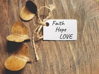 Faith hope love concept. Text with vintage background. - Powered by Adobe