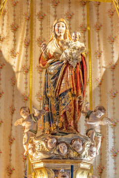 Huelva, Spain-December 4, 2022: The Virgin of Clarines in Main Altar of the parish of San Bartolome of Beas. It is consecrated under the invocation of the apostle Saint Bartholomew