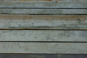 Wooden textured shield in a stripe. Background texture. Old boards.