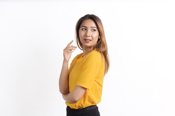 Fototapeta premium Hot asian pretty young woman smiling isolated on white, yellow t-shirt