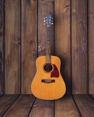Acoustic Guitar in wooden vintage  room.