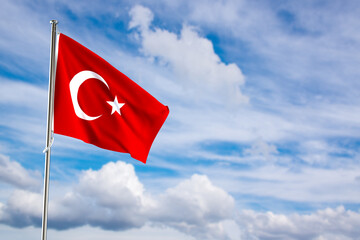 Turkey Flag Waving on a High Quality Blue Cloudy Sky. 3d Rendering
