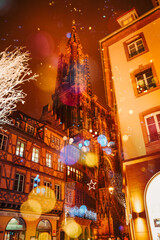 Fototapeta premium STRASBOURG, FRANCE - December 2020 - Cathedral Notre Dame with Christmas illuminations during Christmas Market