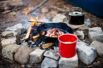 cooking over a campfire