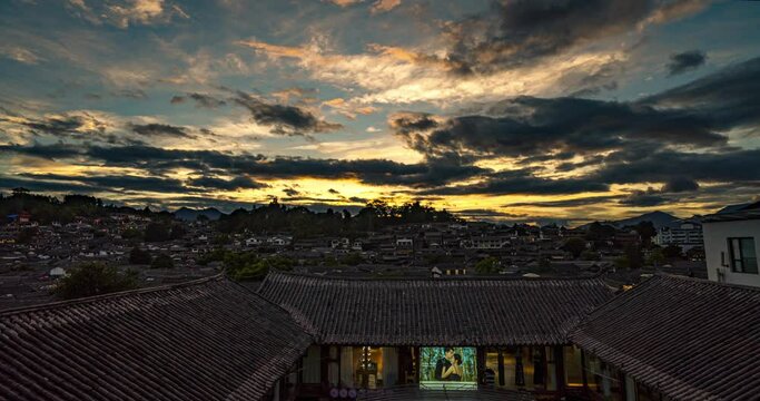 Rooftops in Lijiang old town and jade dragon snow mountains in the background, beautiful view from Lijiang