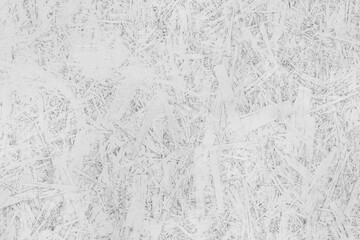 White paint on chipboard surface, pressed wood texture osb background