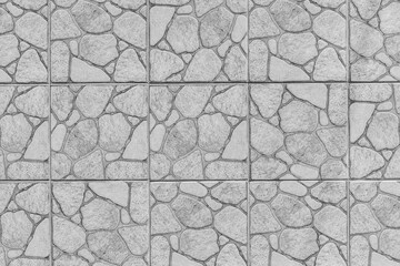 Ceramic tile floor texture with abstract gray pattern stone wall background