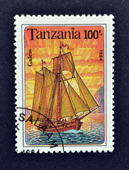Cancelled postage stamp printed by Tanzania, that shows Galeas, circa 1991.