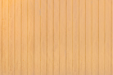 Obraz premium Light yellow coating imitating the wooden fence wall texture plank background