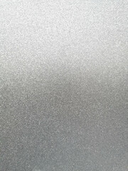 Fondo abstracto con textura suave u degradado de tonos gris metalico y blanco