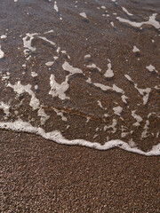 sandy beach and sea waves