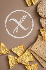 Crossed sprinkler symbol with gluten free bread and snacks, puffed rice bread. 