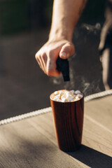 a cup of cocoa with marshmallows