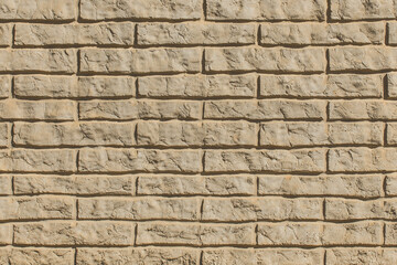 Modern clay brick wall texture, sand interior stone exterior background