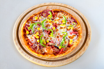Delicious mixed pizza with rich content. Menu concept of choice and diversity. Sucuklu, Mantarli, karisik, akdeniz pizza