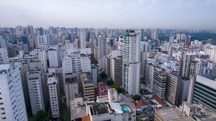 Fototapeta na wymiar Many buildings in the Jardins neighborhood in Sao Paulo, Brazil. Residential and commercial buildings. Aerial view