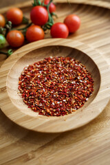 Mixture of spices on a wooden plate. Spices and ingredients for cooking. Ingredients for cooking