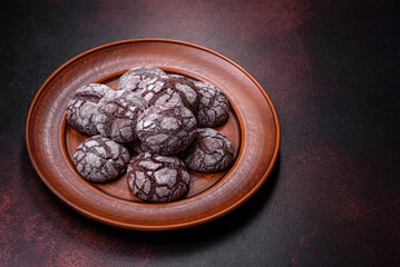 Beautiful tasty sweet cookie brownies on a brown plate