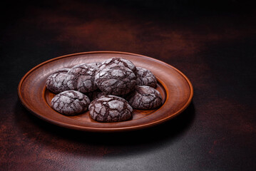 Beautiful tasty sweet cookie brownies on a brown plate