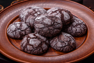 Beautiful tasty sweet cookie brownies on a brown plate