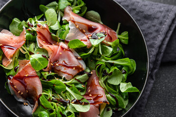 jamon salad aged meat fresh healthy meal food snack on the table copy space food background rustic...