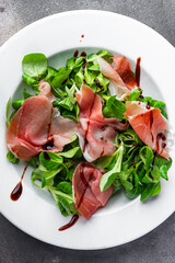 jamon salad aged meat fresh healthy meal food snack on the table copy space food background rustic top view