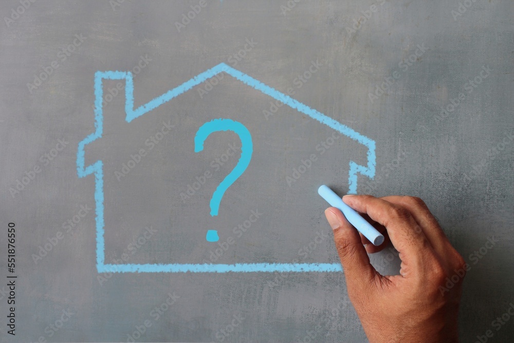 Wall mural house and question mark. real estate house mortgage question and answer concept