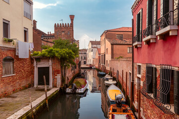 Typical Venetian canal with bridge in early morning, San Barnaba, Venice, Italy