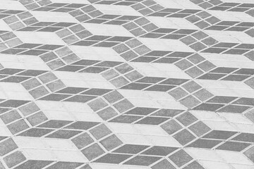 Dark and light sidewalk tile with abstract geometric square pattern paving slab texture street road urban background