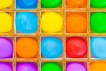 Multicolored bright colorful vibrant balloons background for playing darts game