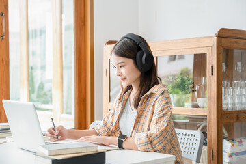 Education concept. Students studying and brainstorming campus concept. Close up of students discussing their subject on books textbooks and writing to notebook.
