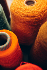Composition of colorful vibrant wool threads from above. Autumn colours
