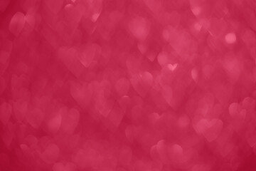 Trendy viva magenta color of the year 2023, pink red hearts, sparkling glitter bokeh background, valentines day abstract defocused texture