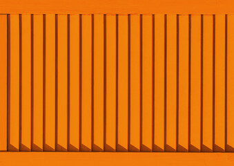 Part of modern interior with orange brown horizontal patterned texture of wooden shutters, casements or blinds background