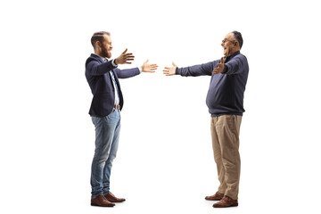 Young man meeting and greeting a mature man