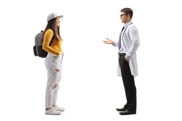 Profile shot of a male doctor talking to a female student