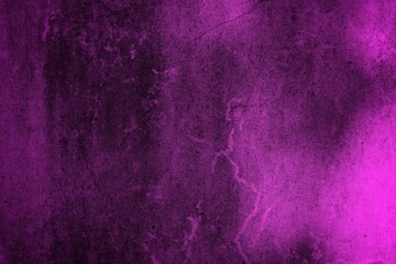 Obraz premium A textured purple concrete wall with a prominent vertical crack. 