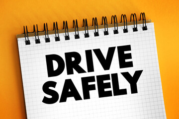 Drive Safely text on notepad, concept background