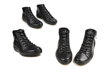 Men's black leather shoes and a black camera on a isolated on white background. Copy space.