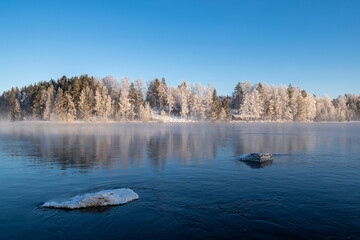 View of Vuoksi river and river bank in winter, Imatra, Finland