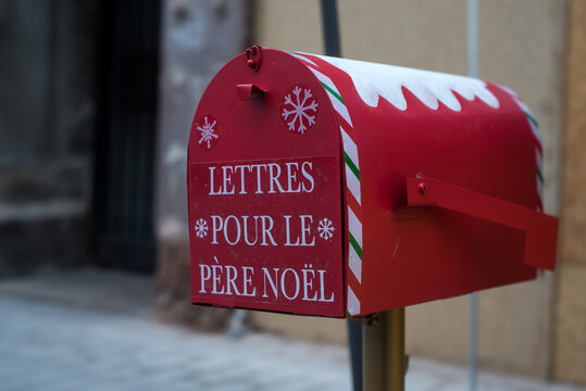 Closeup of mail box with text in french : lettres pour le pere noel, traduction in english, letters forthe santa claus